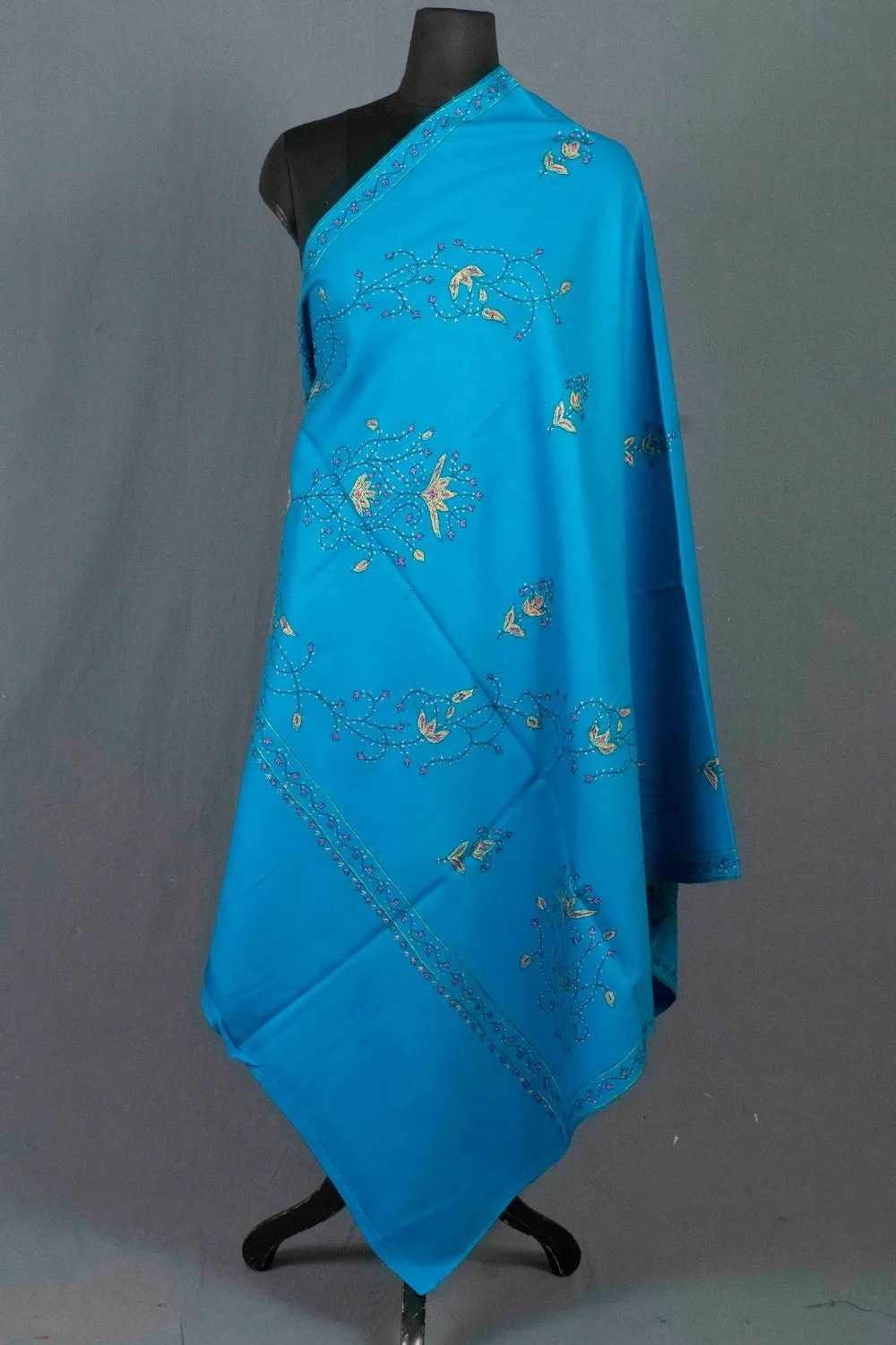 Alluring  Firozi Colour Sozni Shawl Emblished With Designer Over All Jaal And Border.