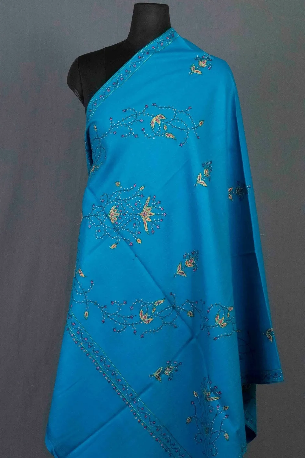 Alluring  Firozi Colour Sozni Shawl Emblished With Designer Over All Jaal And Border.